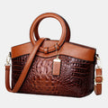 Jaye Crocodile-Pattern Handbag shown in full-grain leather